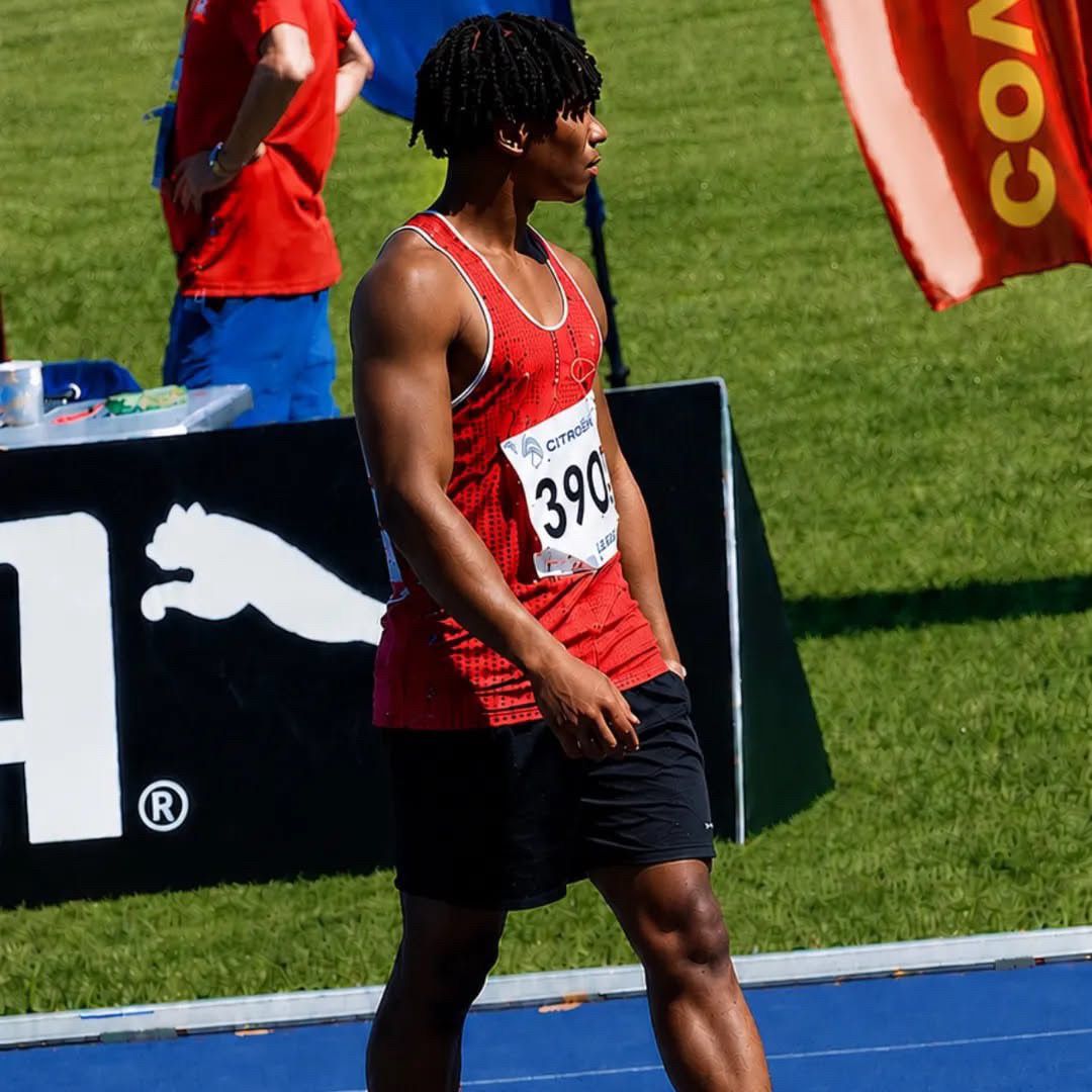 Louis in his club vest at a competition