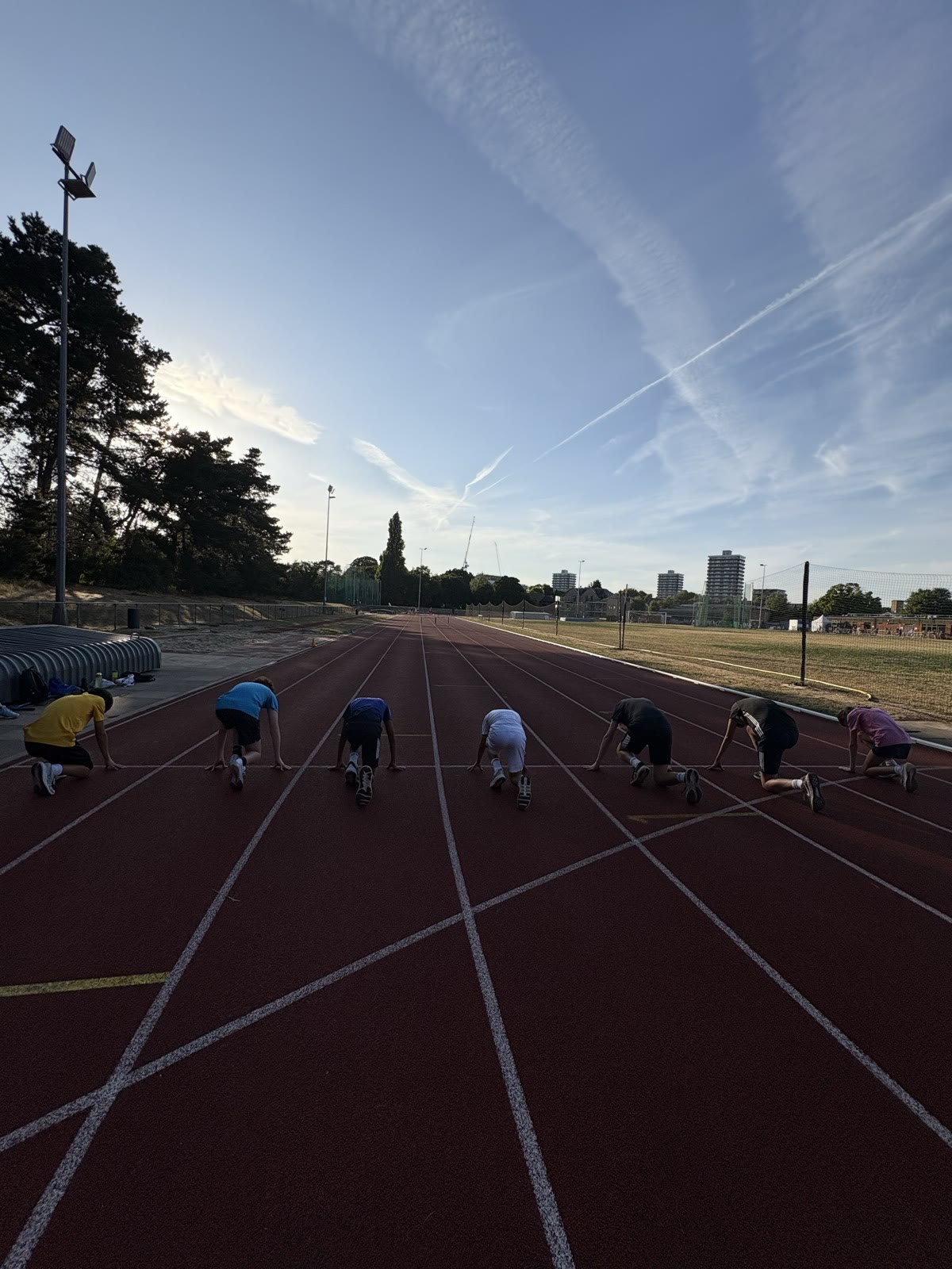 Louis, in the red top, in an elite sprint session with the older group